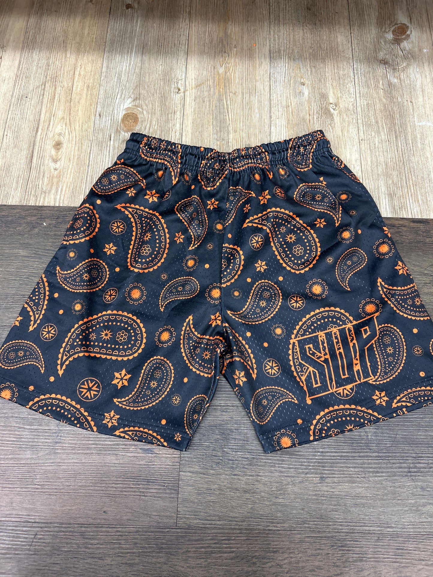 Sup black and orange shorts